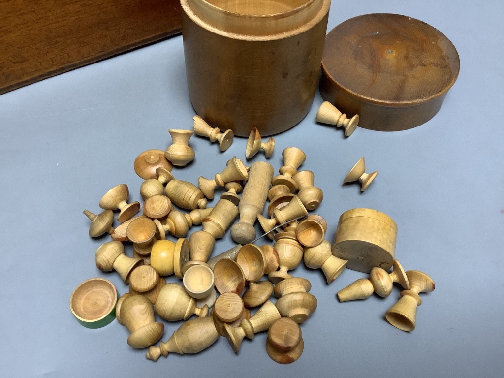 A quantity of treen miniature vessels and a boxed artist's set